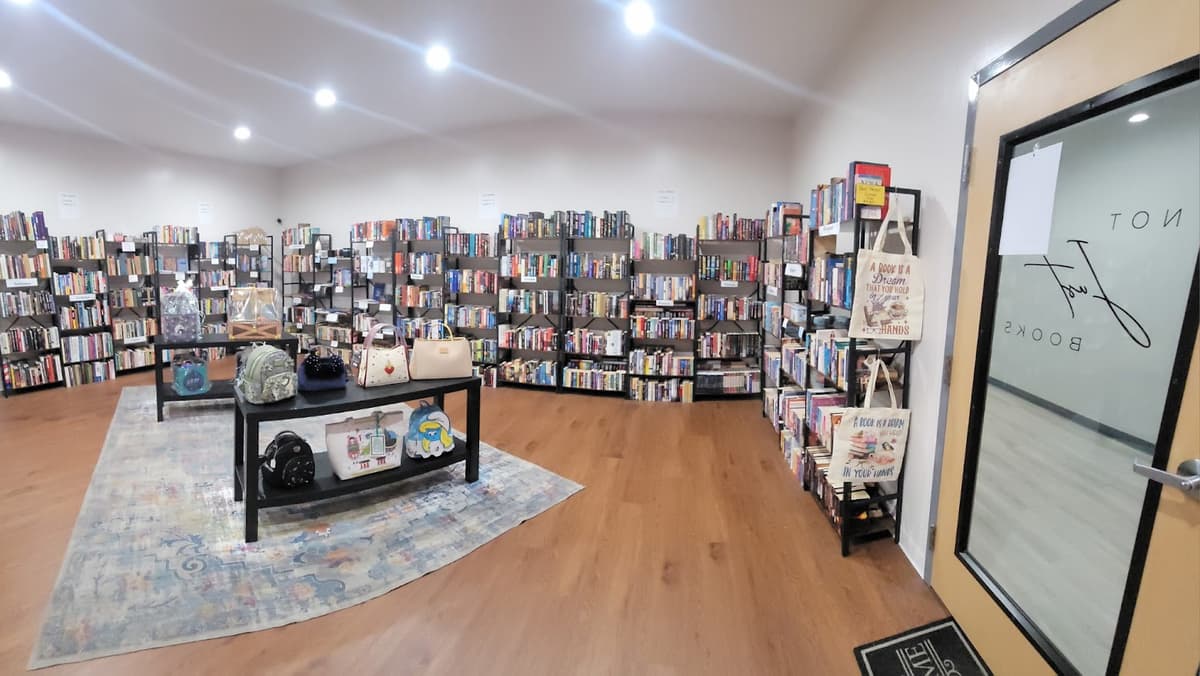Background scene showing books and local makers